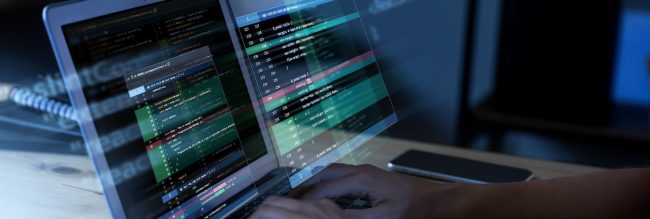 programming-background-with-person-working-with-codes-computer